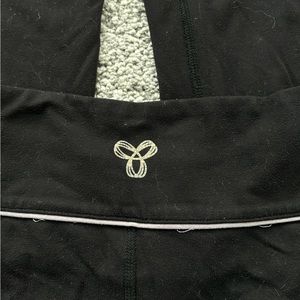 Black TNA Action low rise flare leggings